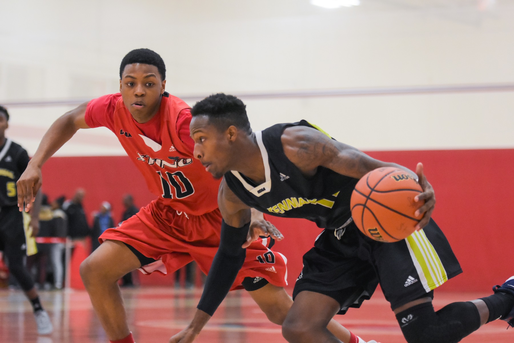 Centennial Colts forward Alastair Cole drives to the rim against Seneca Sting guard Daniel Wright during second half action at Newnham Sports Centre. The Sting pulled away in the fourth quarter and beat the Colts, 90-80. (Yvano Antonio/ Colts Athletics)