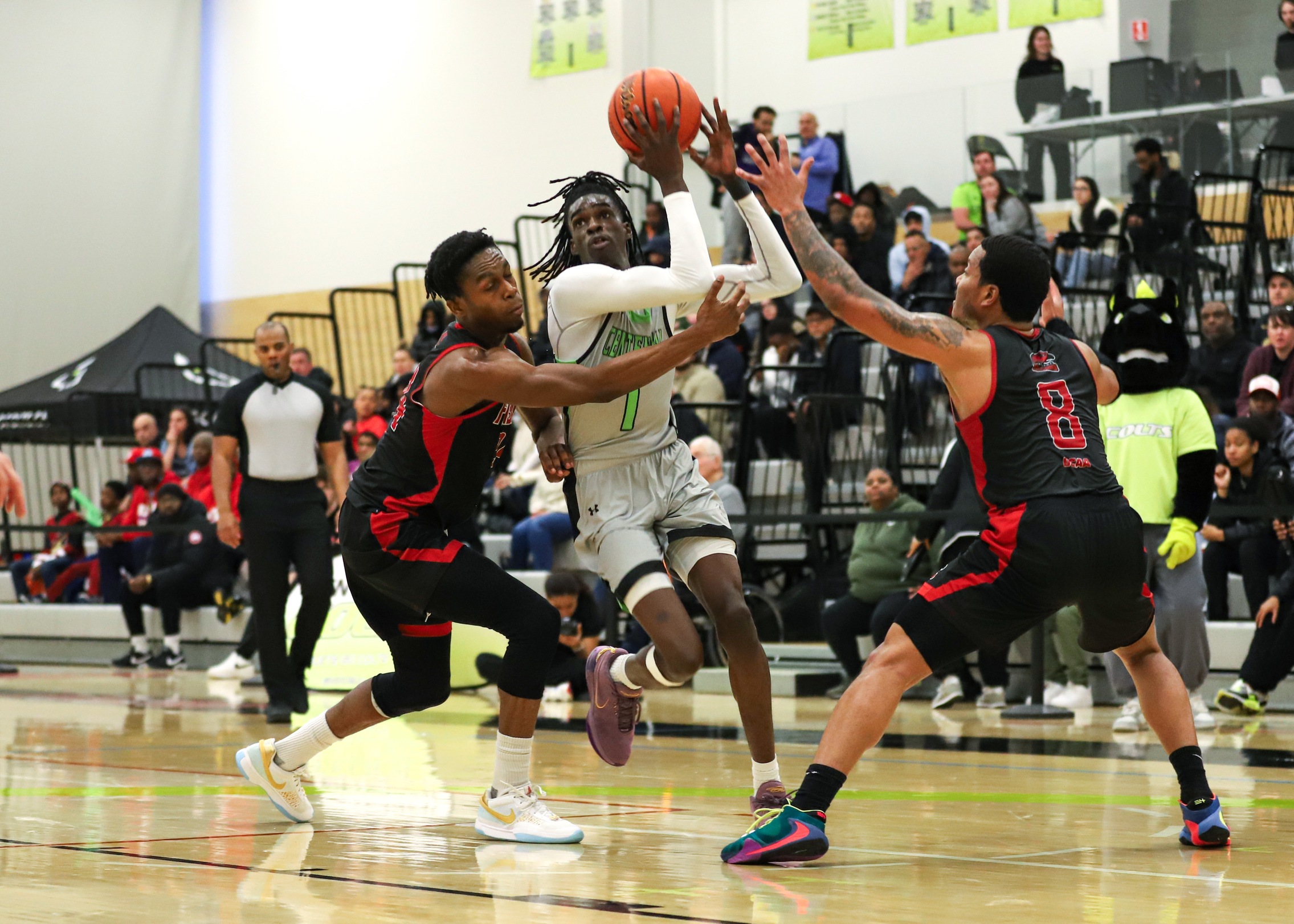 Colts Clash with the Titans: Centennial Faces Off Against Defending Champs St. Clair Saints in OCAA Men's Basketball Battle