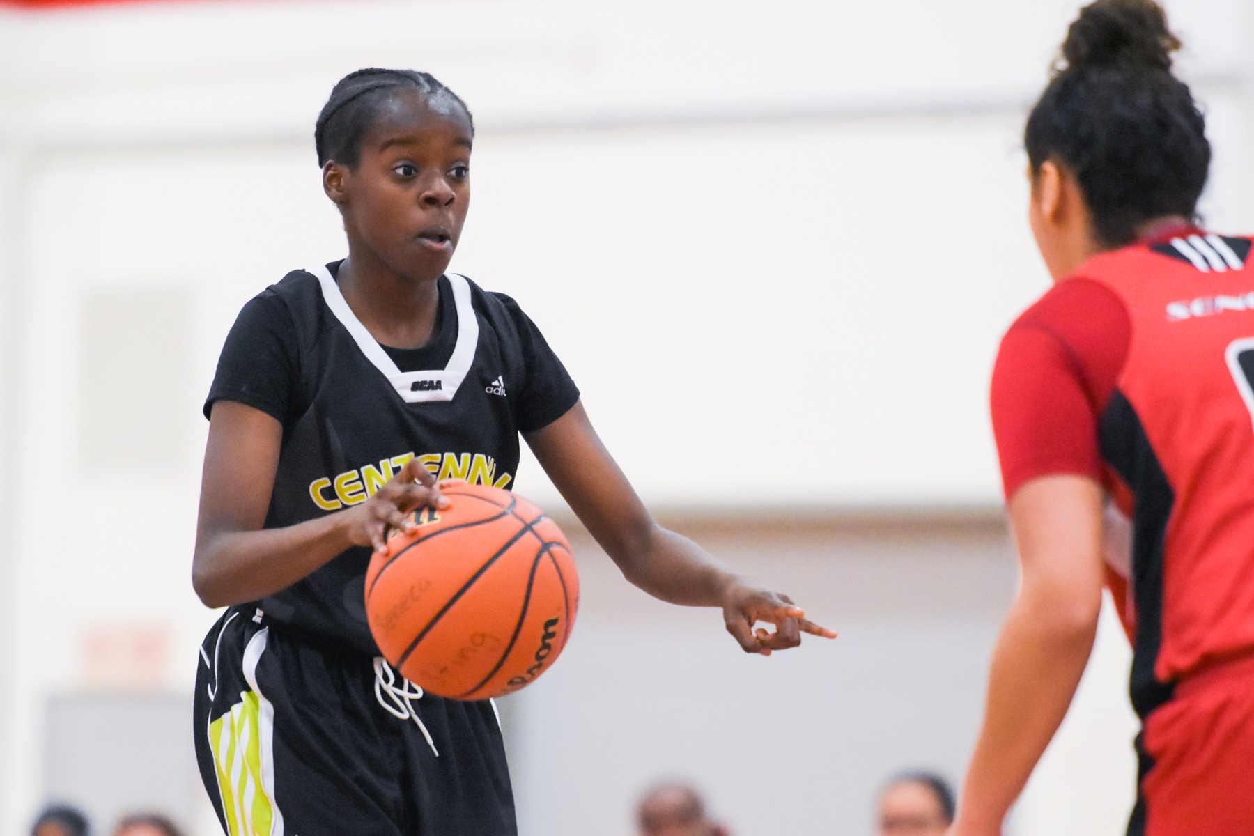 Centennial Colts guard Mariam Konate tries to look for an opening against a Seneca defender during second half action. Konate had a team high 13 points in the Colts' 72-52 against the Sting at Newnham Sports Centre, as they fall to 2-3 on the season. (Yvano Antonio/ Colts Athletics)